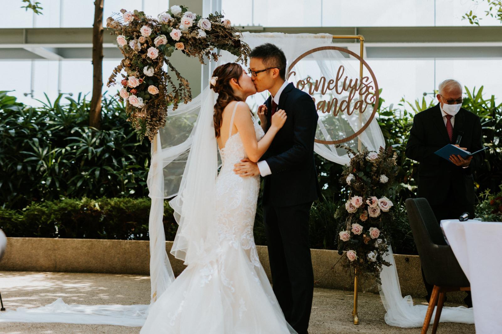 bride and groom kissing
