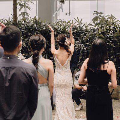 bride throwing bouquet